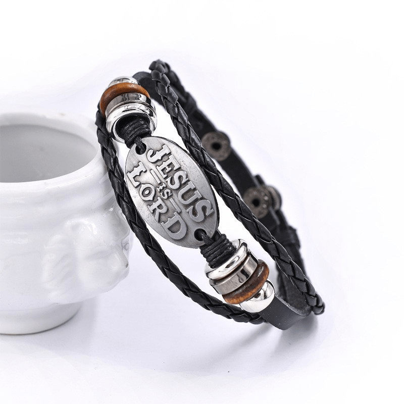 Bracelet en cuir tressé noir avec inscription JESUS IS LORD