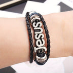 Bracelet de charme Jésus bicolore sur cuir tressé noir