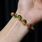 Bracelet en perles de verre rouge, vert et or "Christmas Glory": La foi qui brille