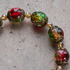 Bracelet en perles de verre rouge, vert et or "Christmas Glory": La foi qui brille