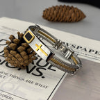 Pulsera de Cable Cruzada Multicolor: Estilo Inspirado en la Fe y Devoción Duradera