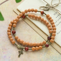 Bracelet chapelet perles fleur de pêcher : Dévotion et grâce terrestre