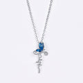 Parure Bijoux Croix Papillon : Dévotion et Symbolisme Artistique