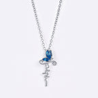 Parure Bijoux Croix Papillon : Dévotion et Symbolisme Artistique
