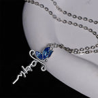 Parure Bijoux Croix Papillon : Dévotion et Symbolisme Artistique