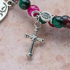 Bracelet chapelet en fil mémoire œil de tigre bicolore avec Saint Michel