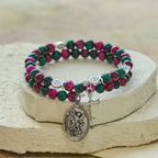 Bracelet chapelet en fil mémoire œil de tigre bicolore avec Saint Michel