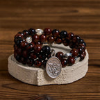 Chapelet bracelet en fil à mémoire de forme obsidienne acajou naturelle avec Jésus