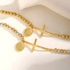 Pulsera de cruz y Nuestra Señora con cuentas: símbolo espiritual con elegancia pulida