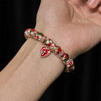Pulsera de Cuentas Rojas Esmaltadas con Colgante de Cruz y Corazón