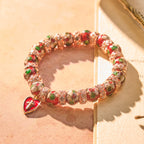 Pulsera de Cuentas Rojas Esmaltadas con Colgante de Cruz y Corazón