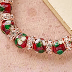 Pulsera de Cuentas Rojas Esmaltadas con Colgante de Cruz y Corazón