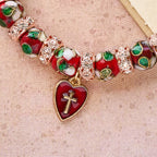 Pulsera de Cuentas Rojas Esmaltadas con Colgante de Cruz y Corazón