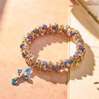 Bracelet détaillé en perles de cloisonné bleues avec crucifix
