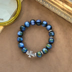 Pulsera de cuentas de resina con cruz brillante: Tierna devoción para los momentos diarios