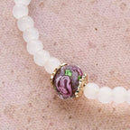 Bracelet Chapelet en Fil à Mémoire avec Accent Floral : Tendre Dévotion pour les Moments Quotidiens