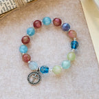 Bracelet de perles pailletées changeant de couleur aux UV avec croix ornée : Scintillez dans des tons de foi