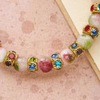 Bracelet scintillant de tourmaline dévotionnelle avec crucifix doré orné