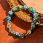 Bracelet de dévotion vintage 10mm en perles bleues effet peinture à l'huile avec Médaille Miraculeuse