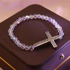 Bracelet Croix Blanc & Bleu Paon : La Foi Enlacée de Reflets Scintillants