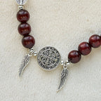 Pulsera de doble protección de cuentas de madera con San Benito y Medalla Milagrosa