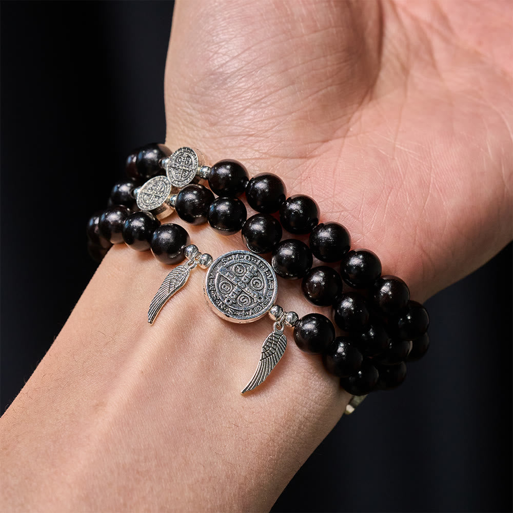 Pulsera de cuentas de sándalo con Medalla Milagrosa y alas de ángel