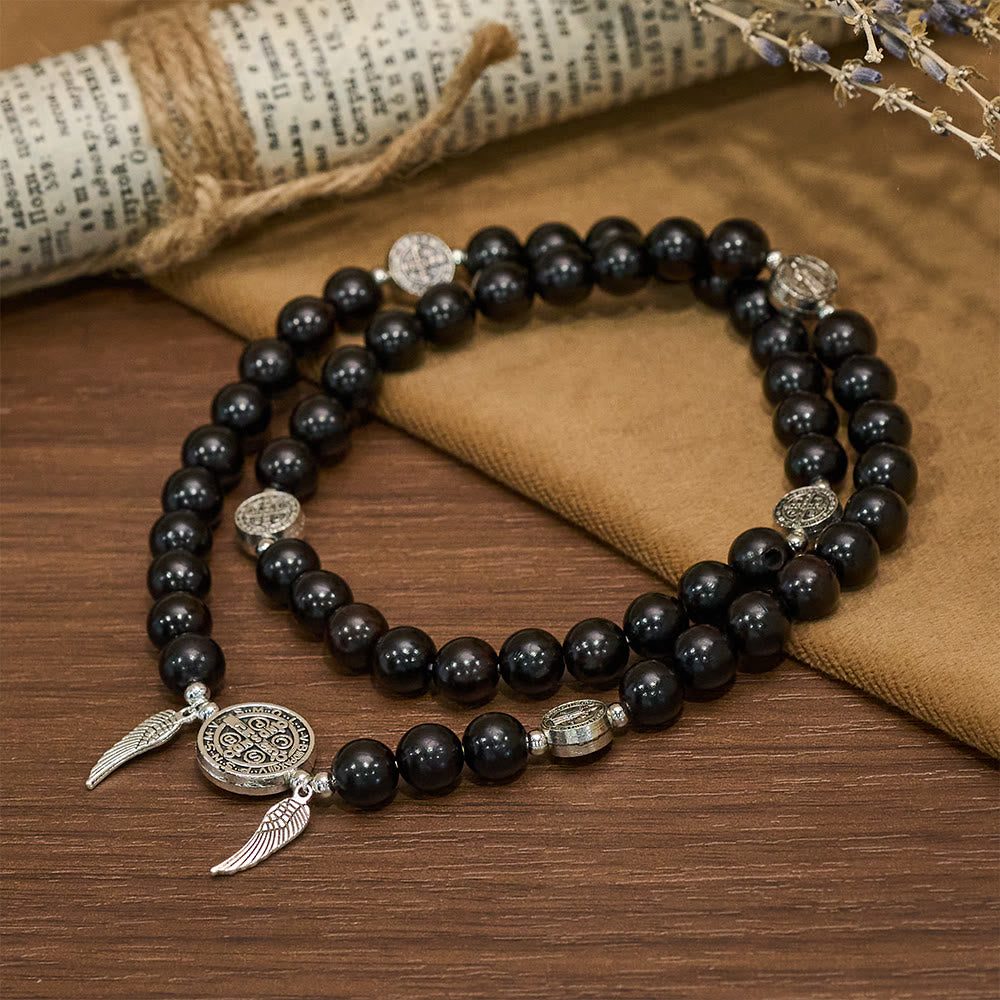 Pulsera de cuentas de sándalo con Medalla Milagrosa y alas de ángel