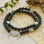 Pulsera de cuentas de sándalo con Medalla Milagrosa y alas de ángel