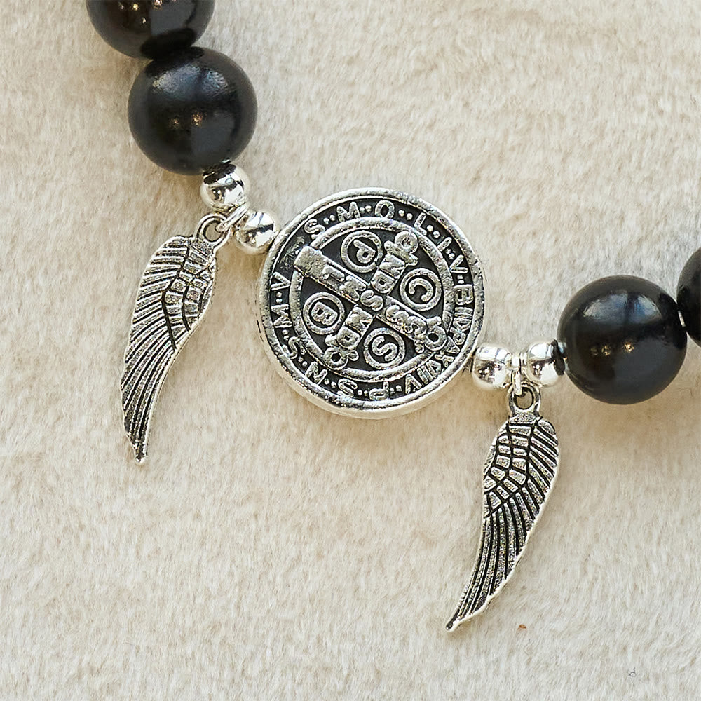 Pulsera de cuentas de sándalo con Medalla Milagrosa y alas de ángel