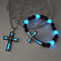 Ensemble de bijoux croix luminescent avec pierre volcanique : Gardez Sa Grâce près de vous après la tombée de la nuit