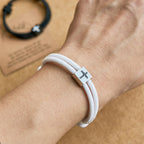 Bracelet croix en corde Milano avec carte-cadeau : bénédiction attentionnée pour les baptêmes et les étapes importantes