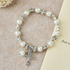 Bracelet perlé Silver Cross Accent : incarnez la grâce de la réflexion pieuse