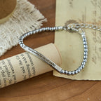 Pulsera de cuentas grabada "Fuerza y Coraje": Un símbolo de fuerza divina y coraje