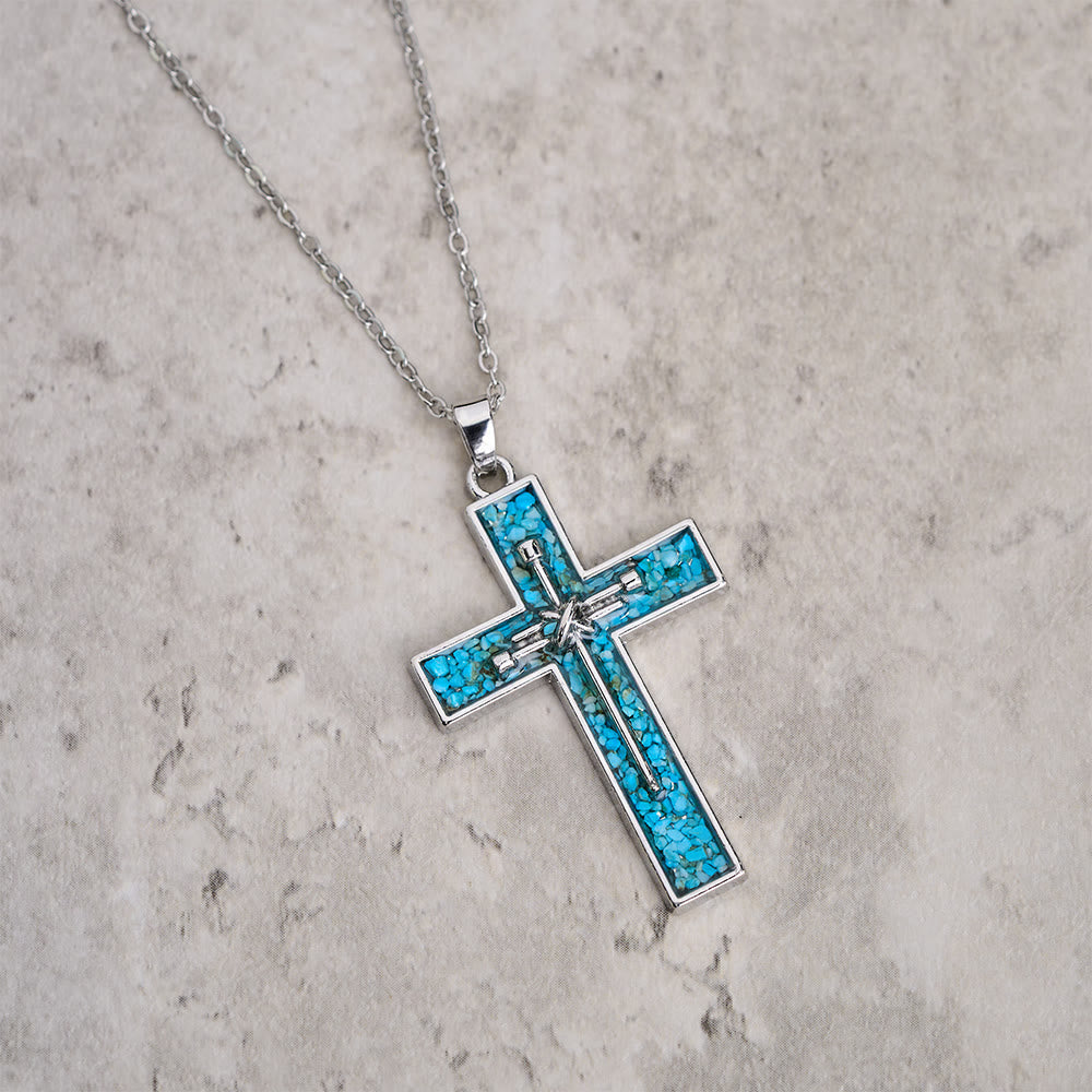 Collar de Cruz de Clavos con Incrustaciones de Turquesa: Un Símbolo del Amor Sacrificial de Cristo