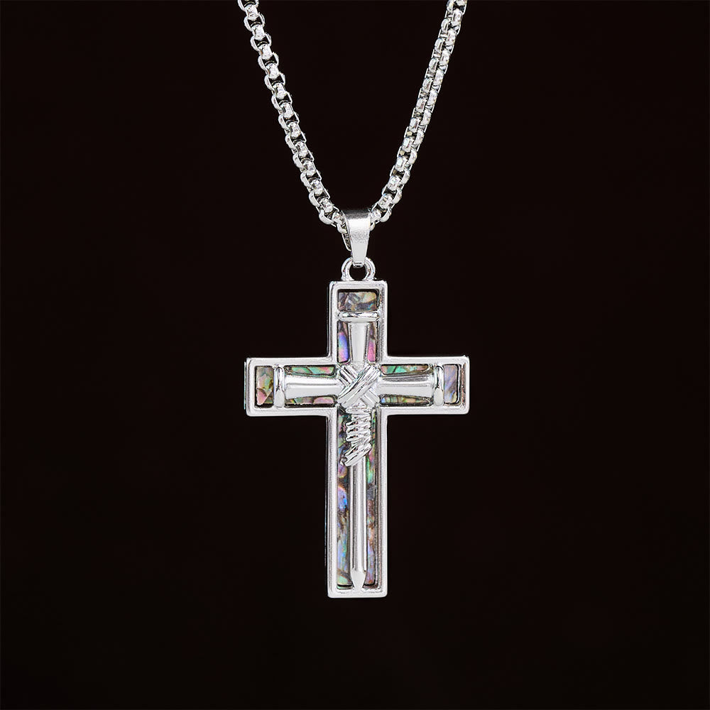 Collar con cruz de clavo con incrustaciones de nácar de abulón: un símbolo del amor sacrificial de Cristo