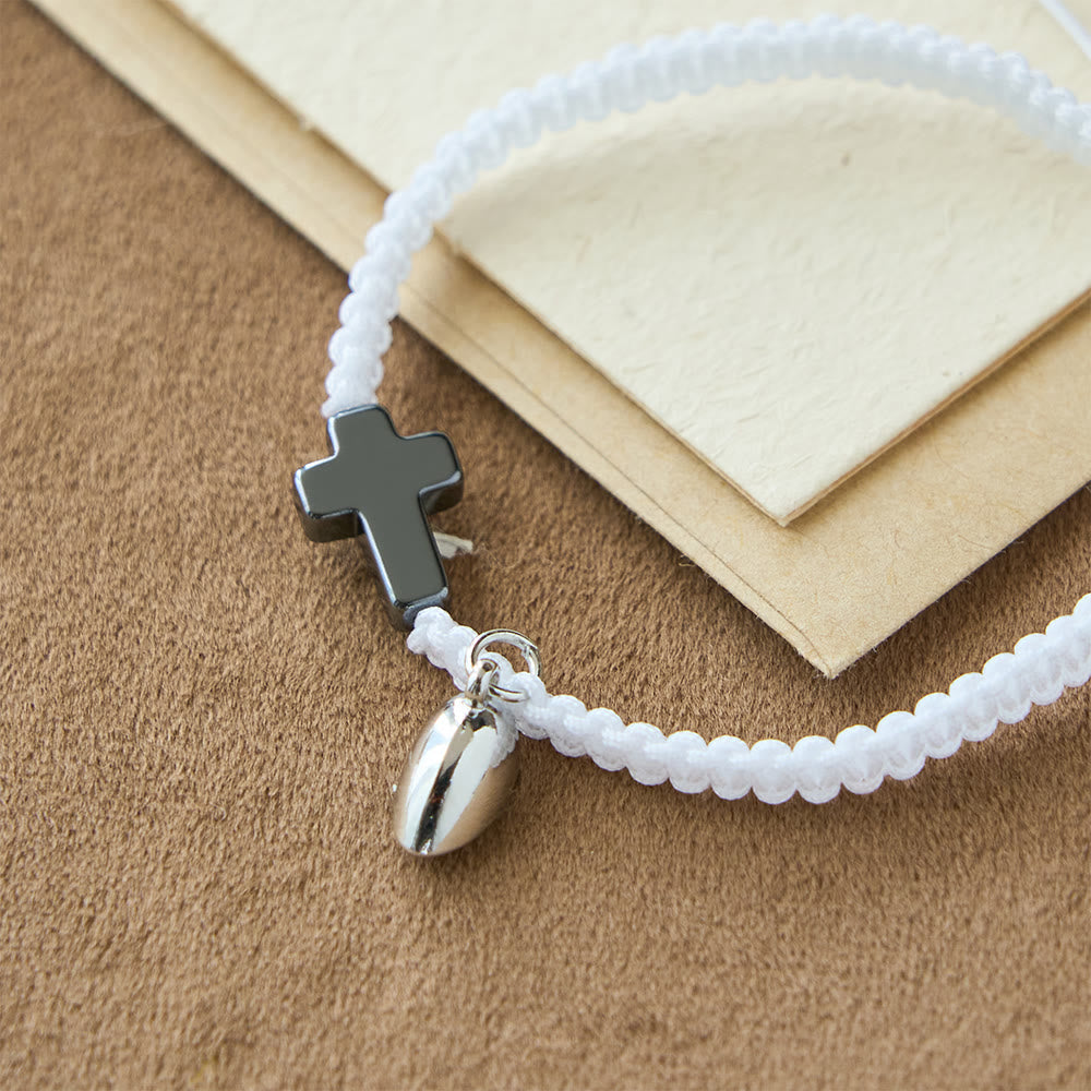 Juego de pulseras magnéticas con cruz de corazón: un símbolo de unión sagrada y amor duradero