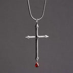 Collier épée avec zircon rouge en forme de goutte : un souvenir sacré pour les croyants