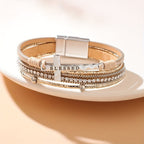 Pulsera de cuero de capas múltiples BLESSED con cruz y circonitas: un símbolo de gracia divina y alegría espiritual