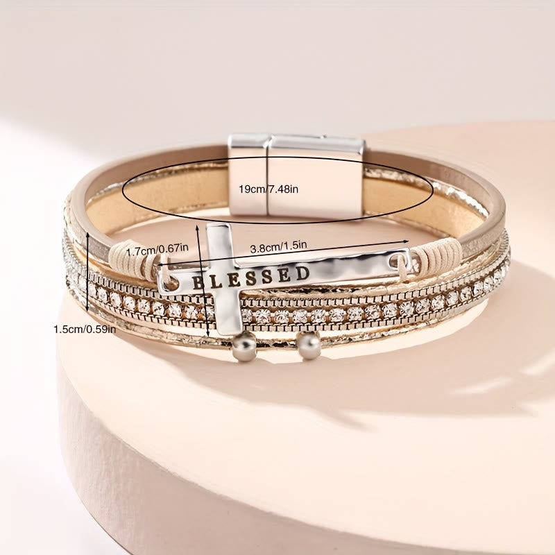 Pulsera de cuero de capas múltiples BLESSED con cruz y circonitas: un símbolo de gracia divina y alegría espiritual