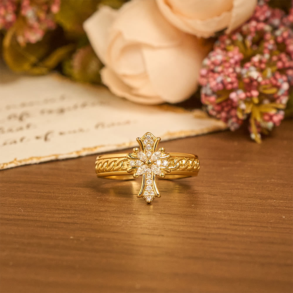 Bague sertie de zircon et émaillée de fleur de lys : emblème de pureté et de rédemption divines