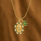 Parure collier Notre-Dame ornée et croix ailée : Emblème de protection spirituelle