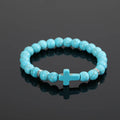Bracelet en perles rondes turquoise avec croix