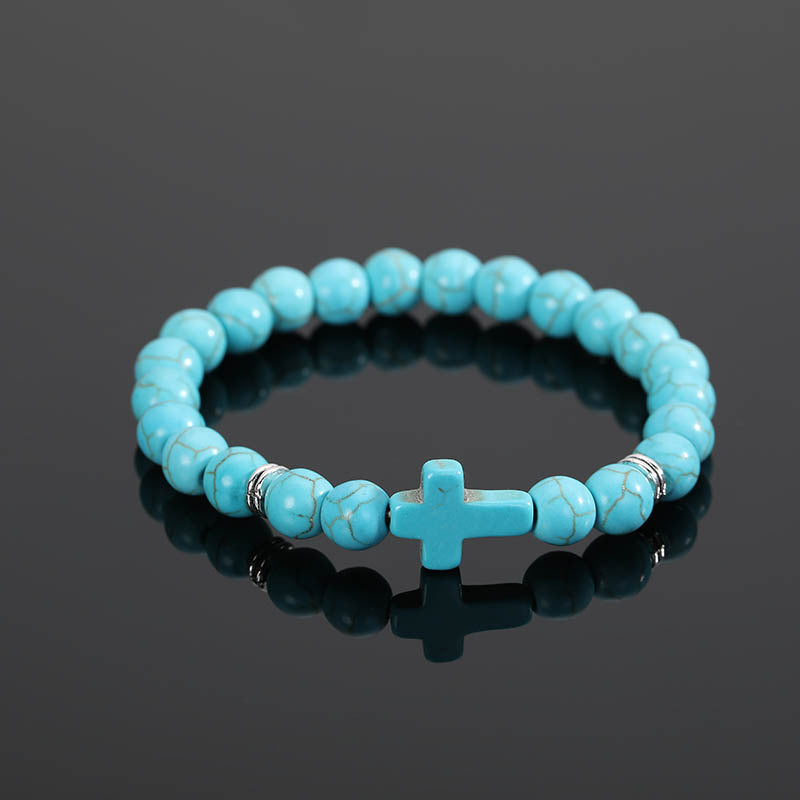 Bracelet en perles rondes turquoise avec croix