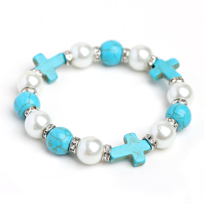 Pulsera de energía curativa con cruz de perlas y turquesas
