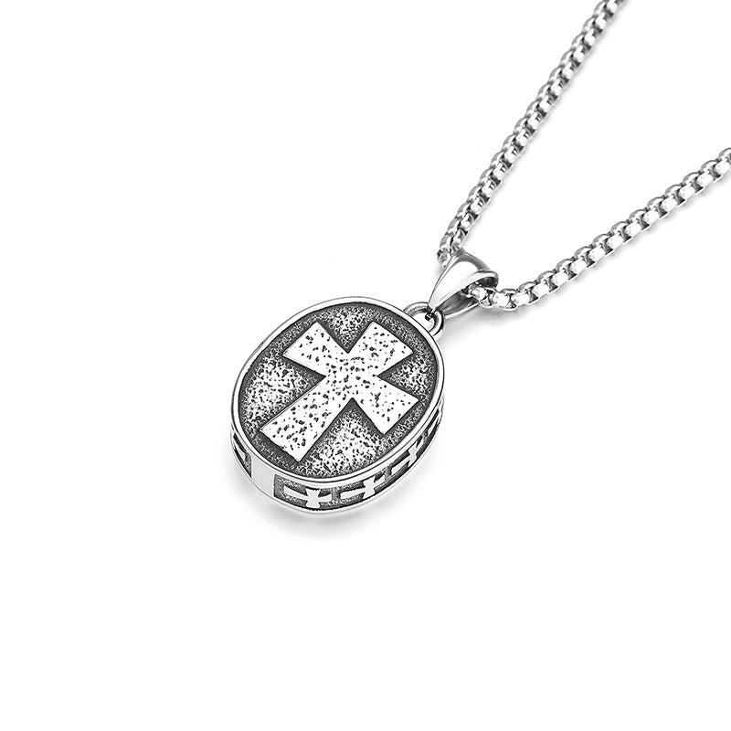 Collier en titane avec pendentif Médaille du Christ Saint dorée