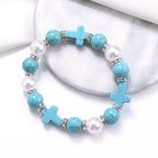 Pulsera de energía curativa con cruz de perlas y turquesas