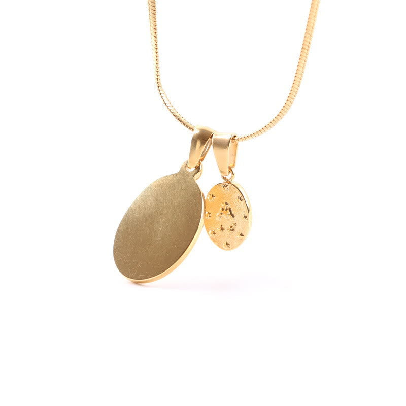 Collier en or double pendentif Notre-Dame rond
