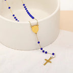 Collier de perles en verre avec pendentif médaille Vierge Marie et croix