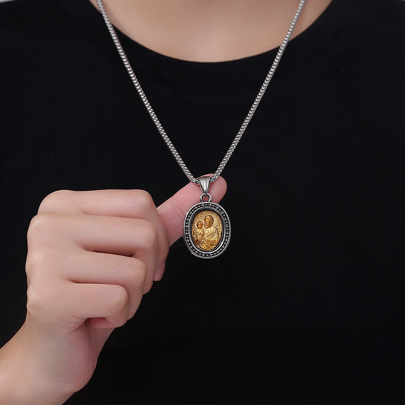Collier en titane avec pendentif Médaille du Christ Saint dorée