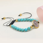 Bracelet perlé de prière et bénédiction Saint Benoît turquoise